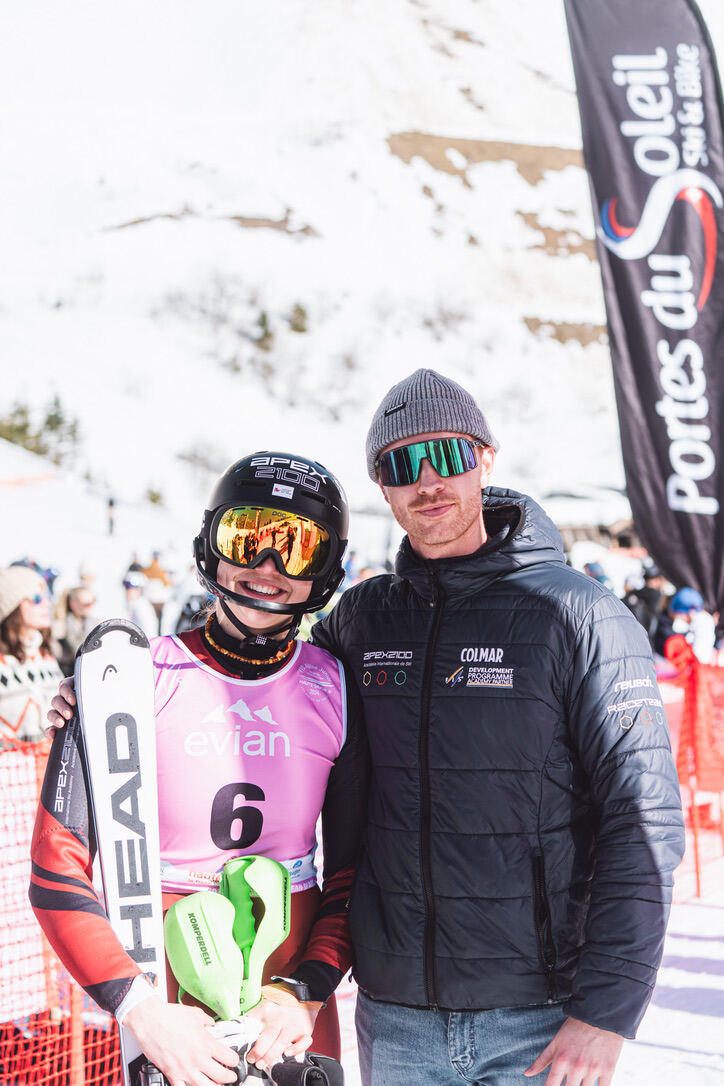 With an athlete at a ski race
