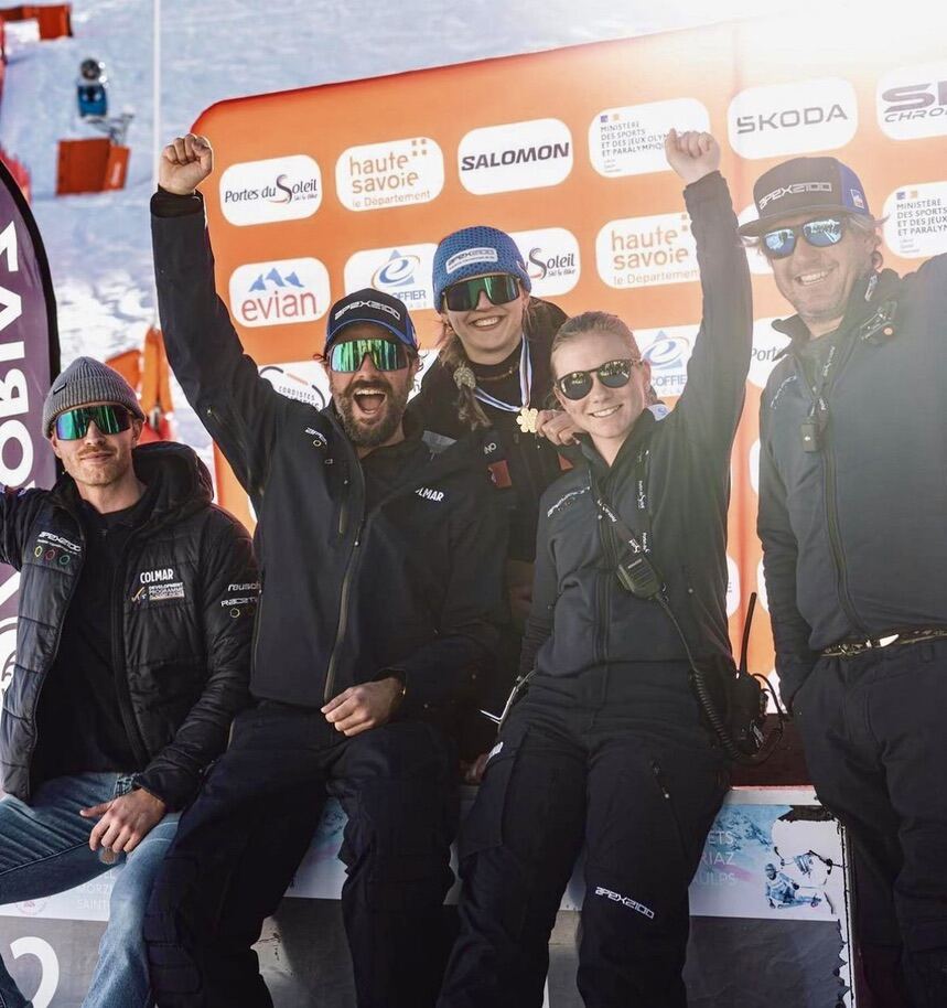 Team celebrating at a race